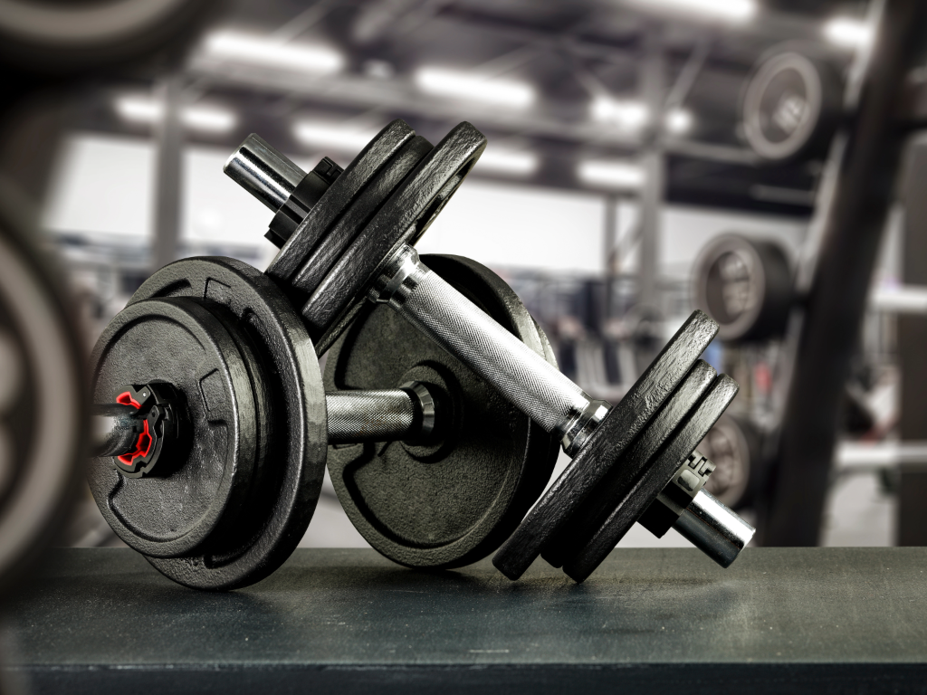 Close up of dumbells at a gym.