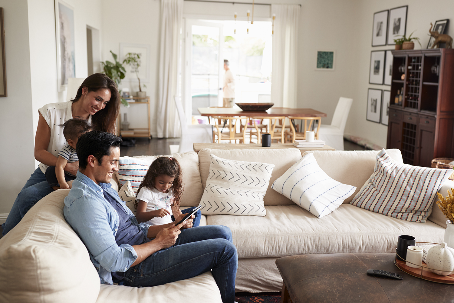 Department Page Graphic: Family hanging on couch