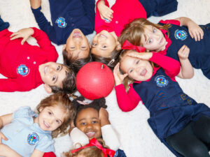 Children laying in a circle at the International School of Arizona